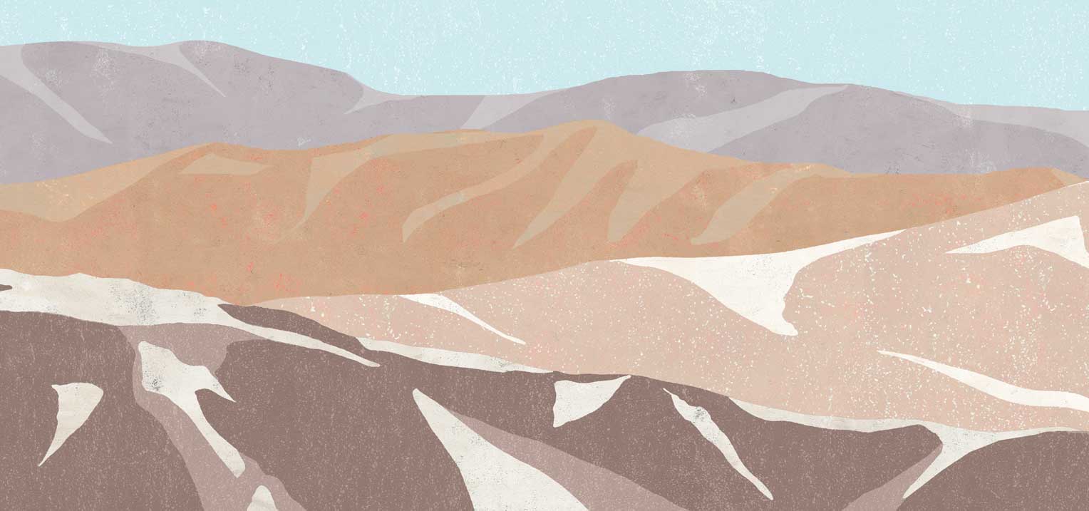 Why can mountains in the desert horizon look purple at times?